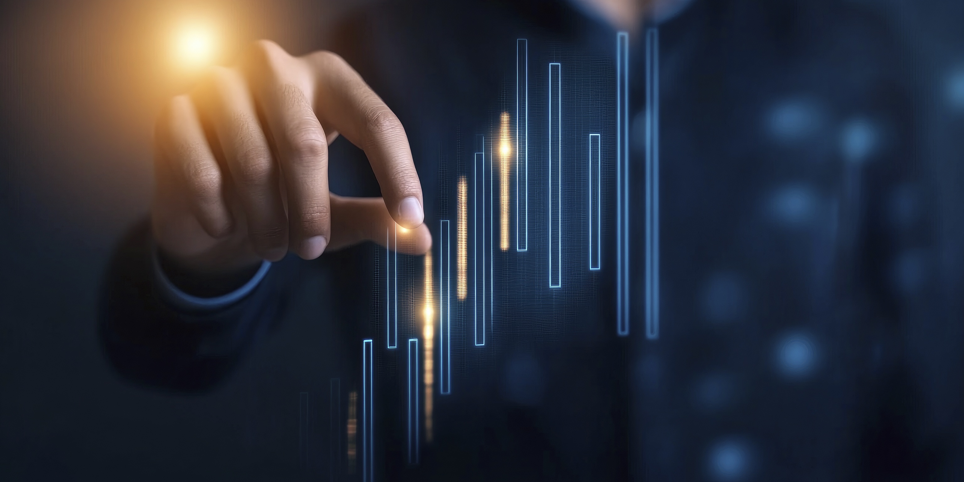 Businessman touching a digital screen with a stock market graph and candlestick chart, Concept for a financial trading platform technology.